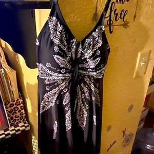 Very cute babydoll top with a bodysuit underneath! Flowing spaghetti strap top!